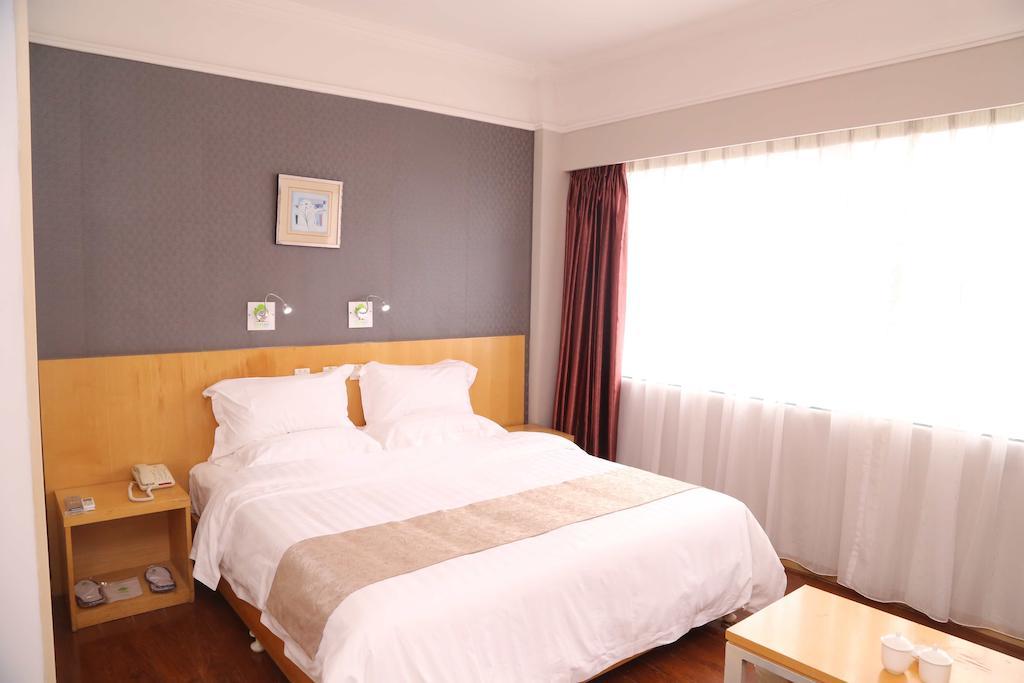 Qingdao Fu Yong Hotel Oda fotoğraf